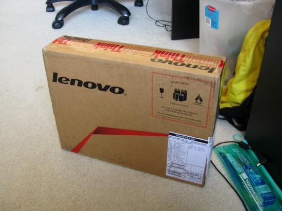 The packaging, with the laptop's serial number clearly exposed.